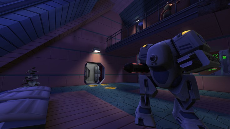 Security mech patrols sci-fi hallway in System Shock Remastered