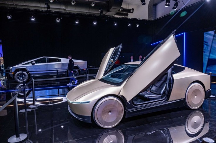Tesla concept cars on display with open gullwing doors