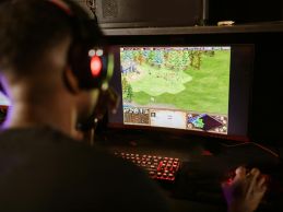 guy playing game in pc