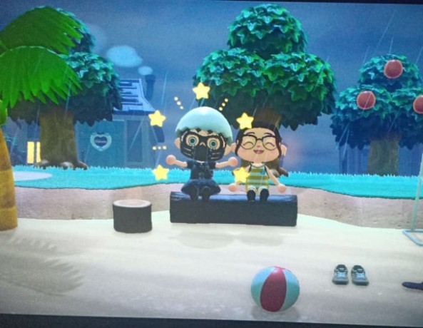 Picture of a Nintendo Switch with Animal Crossing on the screen